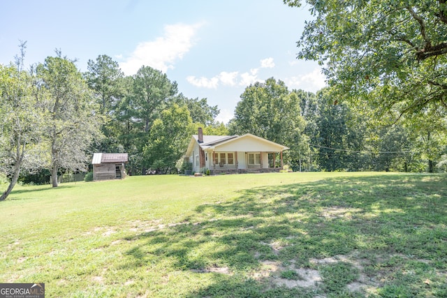 view of yard with a porch