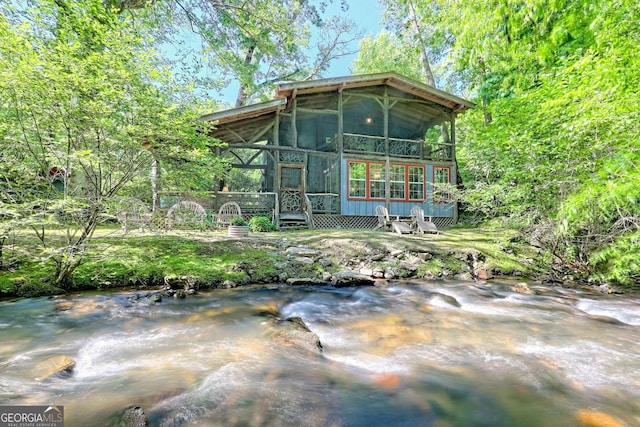 605 W Wildcat Rd, Clarkesville, GA 30523 - rear view of property with a sunroom