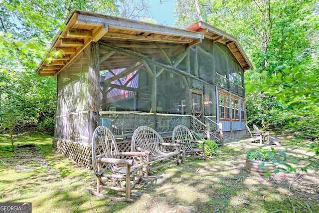 605 W Wildcat Rd, Clarkesville, GA 30523 - view of outdoor structure with a sunroom