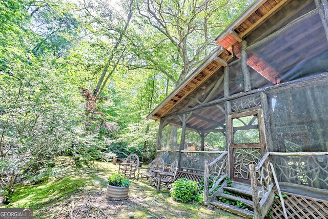 605 W Wildcat Rd, Clarkesville, GA 30523 - view of yard featuring a sunroom