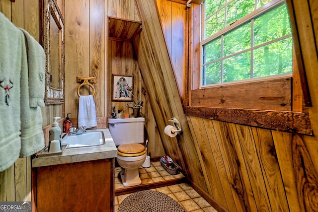 605 W Wildcat Rd, Clarkesville, GA 30523 - half bathroom featuring wooden walls, vanity, and toilet