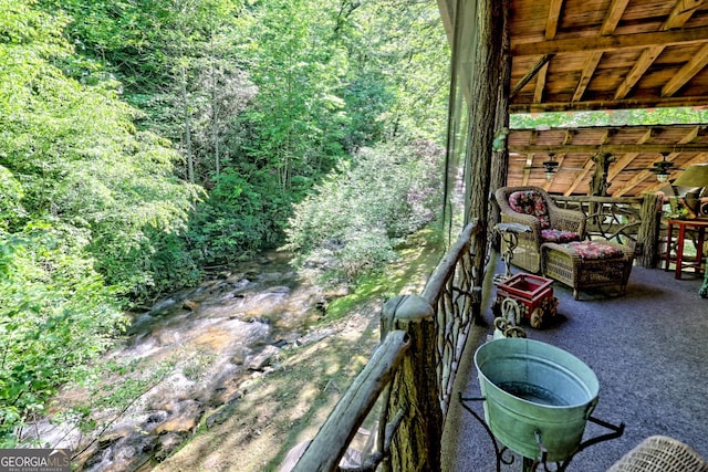 605 W Wildcat Rd, Clarkesville, GA 30523 - balcony with a ceiling fan and a wooded view