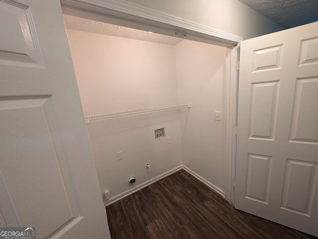 washroom with hookup for an electric dryer, dark wood-type flooring, and washer hookup