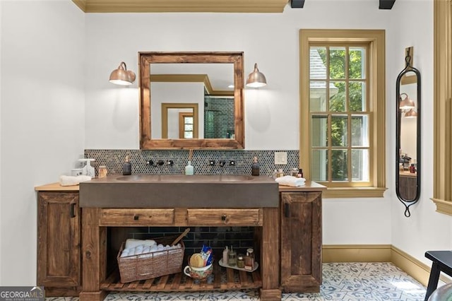 bathroom with vanity and backsplash