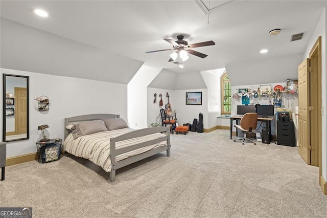 carpeted bedroom with vaulted ceiling and ceiling fan