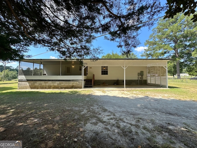 view of front of home featuring a carport