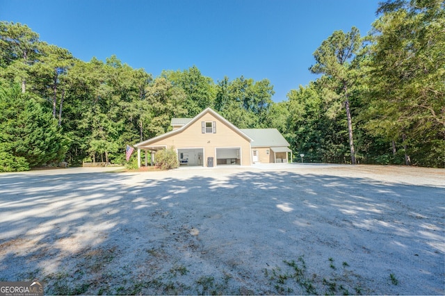 view of property exterior featuring a garage