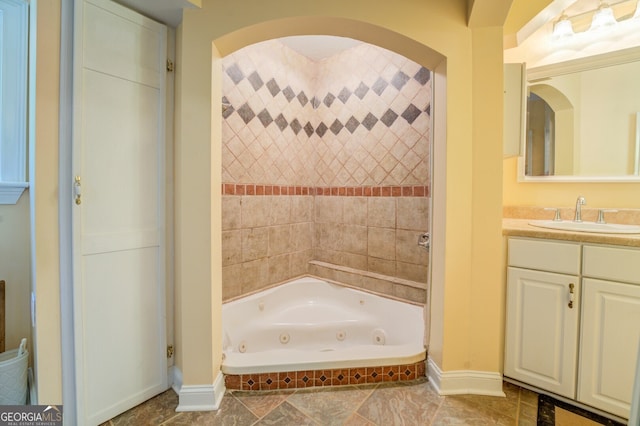 bathroom featuring tile patterned flooring and vanity