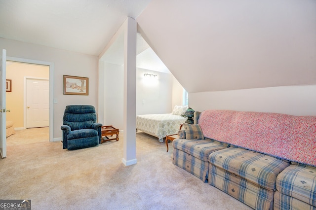 interior space with lofted ceiling and light carpet