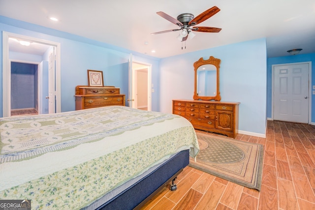 bedroom featuring ceiling fan and light hardwood / wood-style flooring