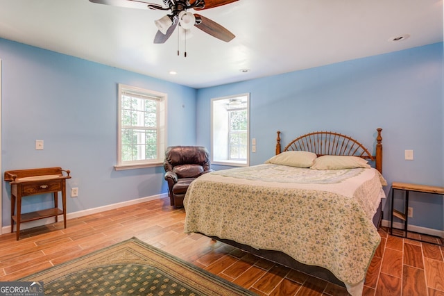 bedroom featuring ceiling fan and hardwood / wood-style floors