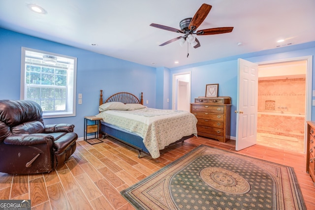 bedroom with ceiling fan and light wood-type flooring