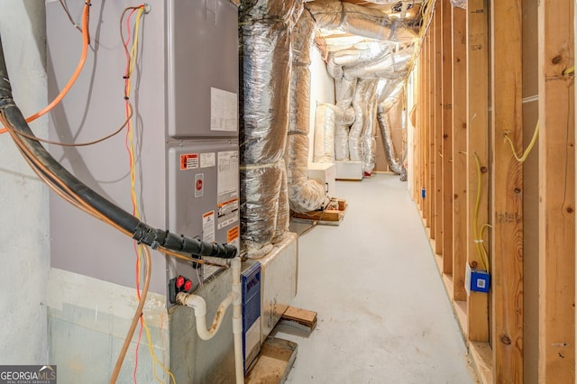 utility room with heating unit