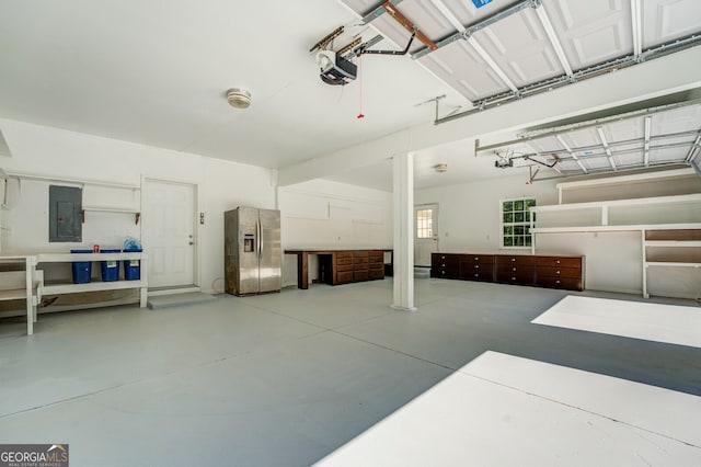 garage featuring stainless steel fridge with ice dispenser, a garage door opener, and electric panel