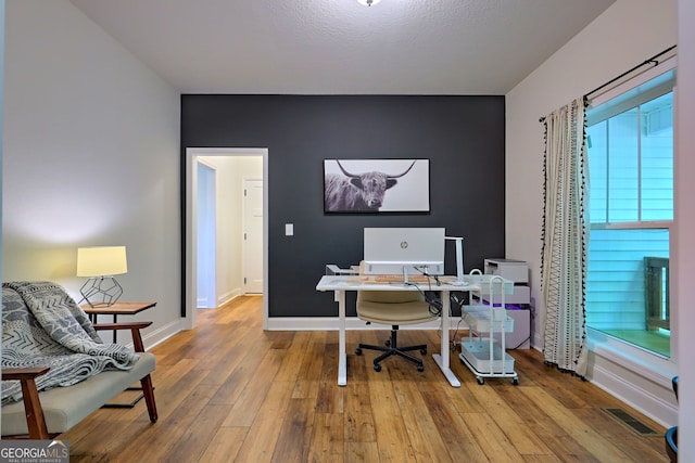 office featuring hardwood / wood-style floors