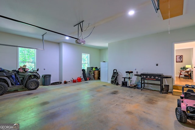 garage featuring a garage door opener