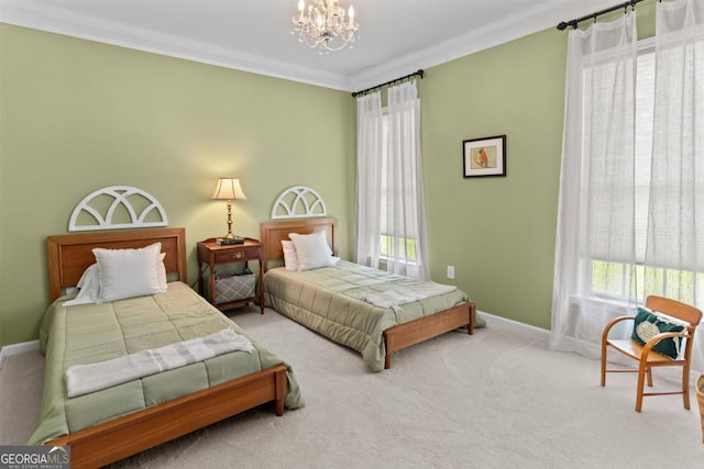 carpeted bedroom featuring an inviting chandelier and ornamental molding