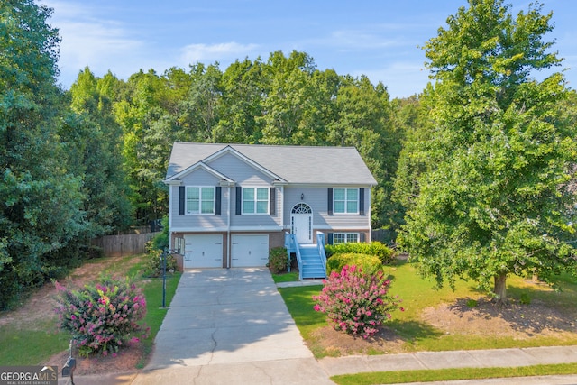 split foyer home featuring a garage