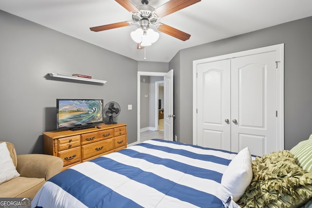 bedroom featuring a closet and ceiling fan