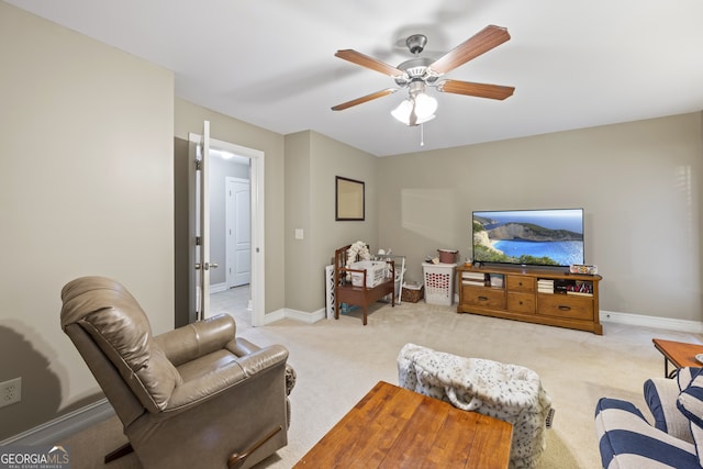 living room with ceiling fan and light carpet