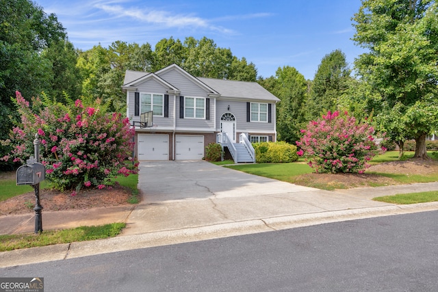 bi-level home featuring a garage