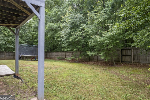 view of yard featuring a trampoline