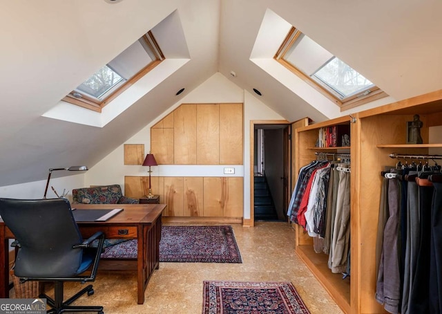 office space featuring lofted ceiling