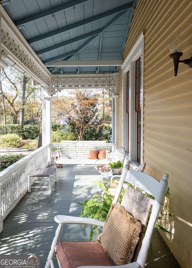 view of patio featuring a porch