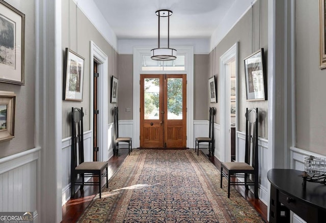 foyer with dark wood-type flooring