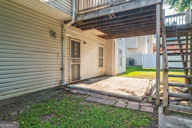 exterior space with a wooden deck and cooling unit