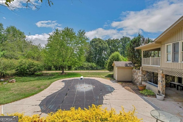 view of patio / terrace with a storage unit