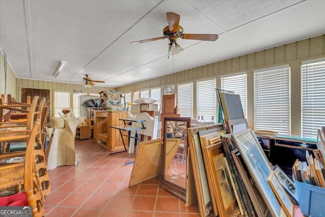 miscellaneous room featuring tile patterned flooring and ceiling fan