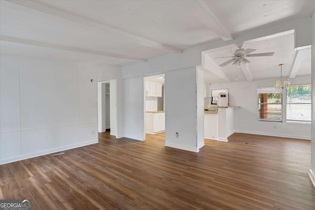 unfurnished living room featuring ceiling fan with notable chandelier, beam ceiling, and wood-type flooring