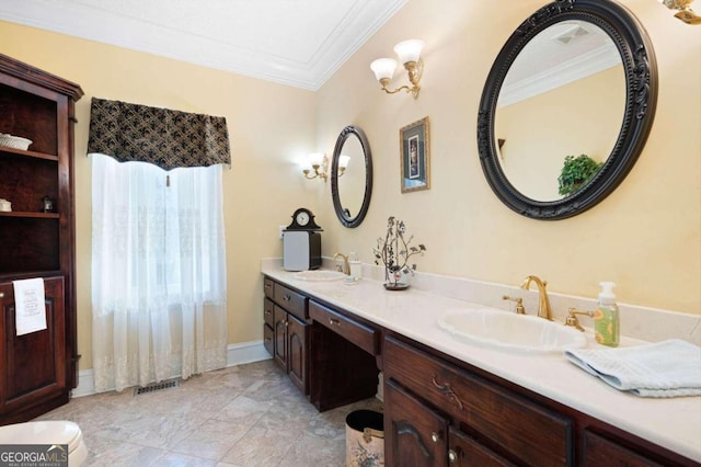 bathroom featuring crown molding, dual bowl vanity, and tile patterned floors