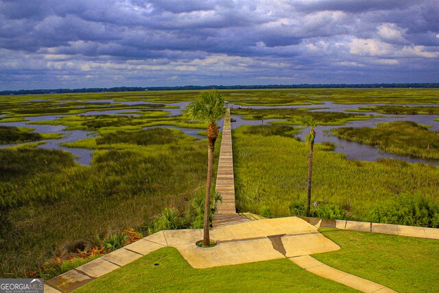 bird's eye view featuring a water view and a rural view