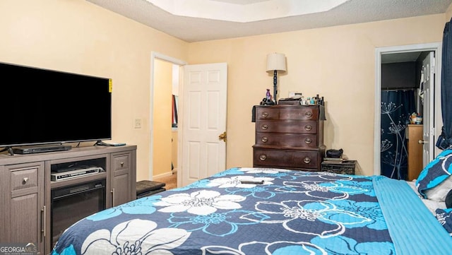 bedroom featuring a tray ceiling