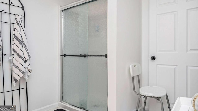 bathroom with an enclosed shower