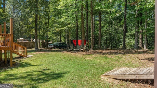 view of yard featuring a deck