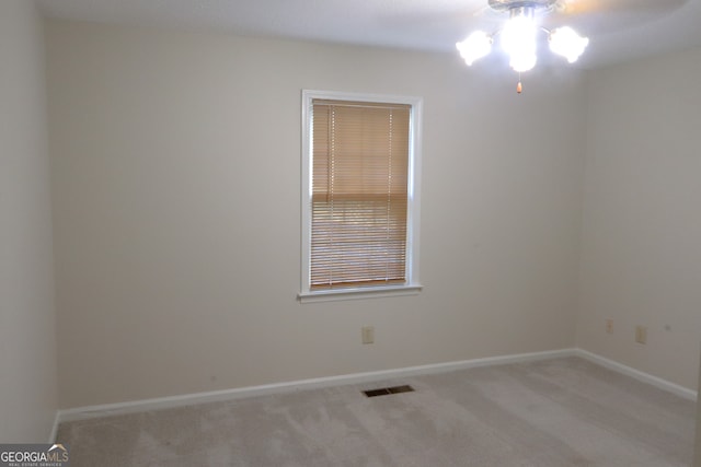 view of carpeted spare room