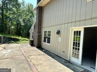 view of property exterior featuring a patio