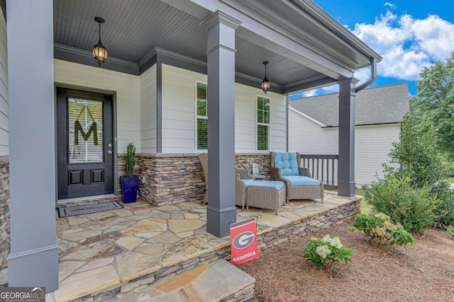 doorway to property with covered porch