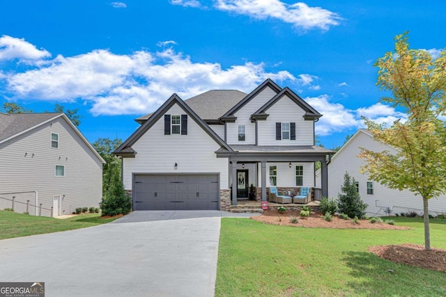 view of front of house featuring a front yard and covered porch