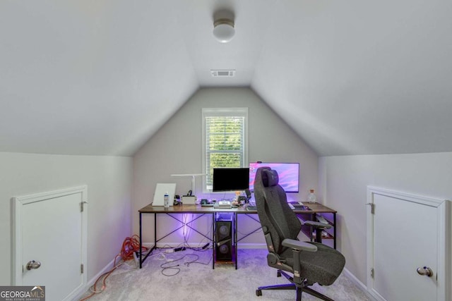 office space with carpet and lofted ceiling