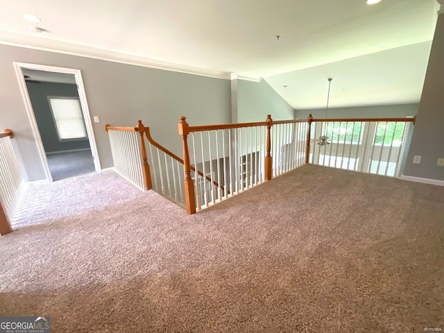 staircase with carpet flooring and lofted ceiling