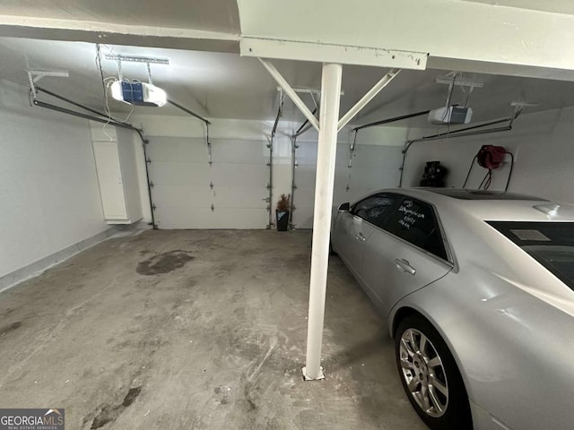 garage featuring a garage door opener