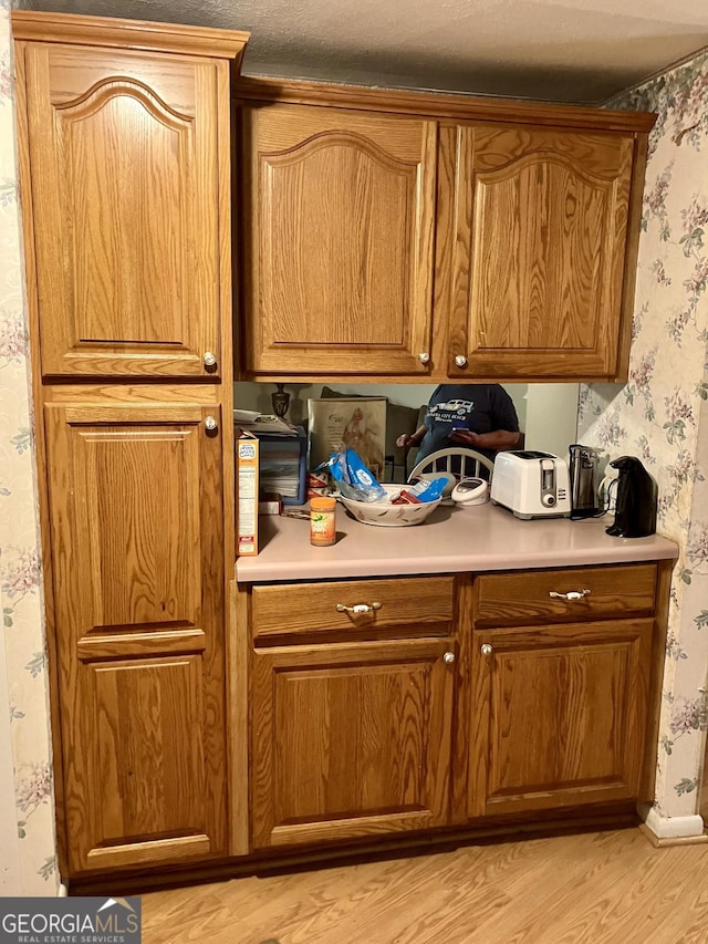 kitchen with light hardwood / wood-style flooring