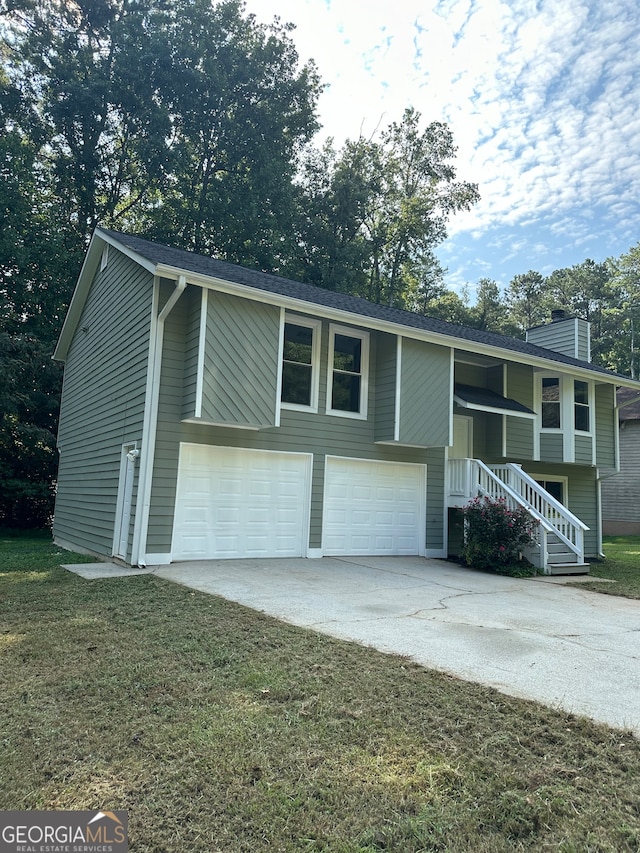 split foyer home featuring a garage