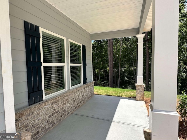 view of patio featuring a porch