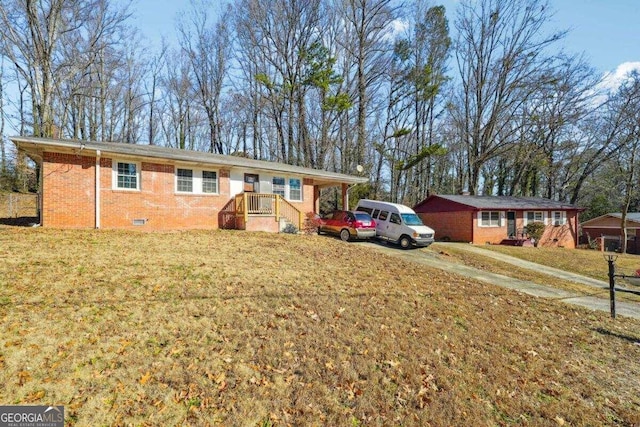 ranch-style home with a front lawn