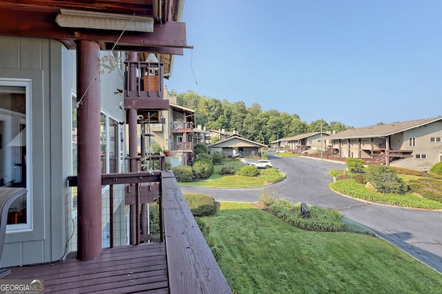 view of yard featuring a balcony